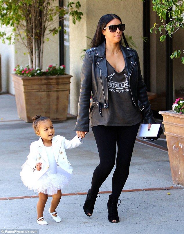 292A9AB900000578-3105308-And baby makes four Kim seen here with North known as Nori was t-a-68 1433133440812 094e2