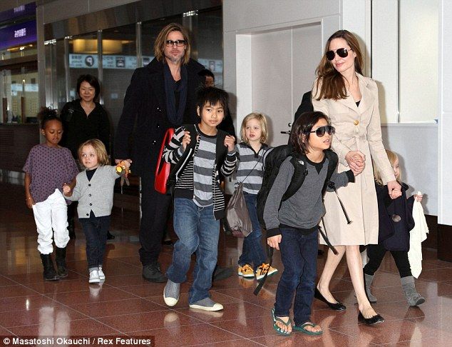 19C4752B000005DC-2948359-Happy Last year Angelina and husband Brad Pitt pictured here in -m-93 1423608778504