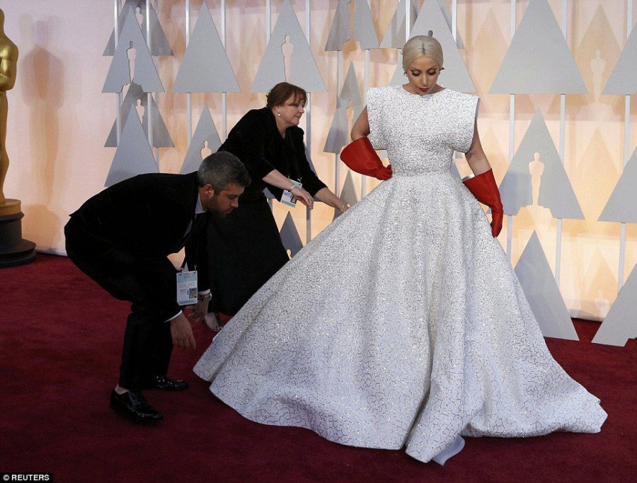 25F8056400000578-2964465-Lady Gaga usually gravitates towards dresses that flatter her sh-a-8 1424674283064 3ae42