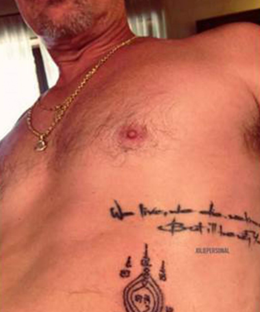 1454647389898 Brad Pitt tattoo 0eeab