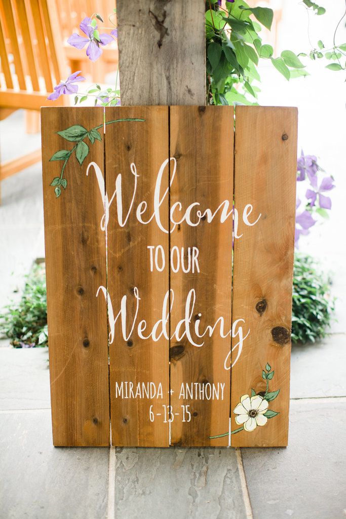 Welcome guests calligraphic wooden sign 56f47