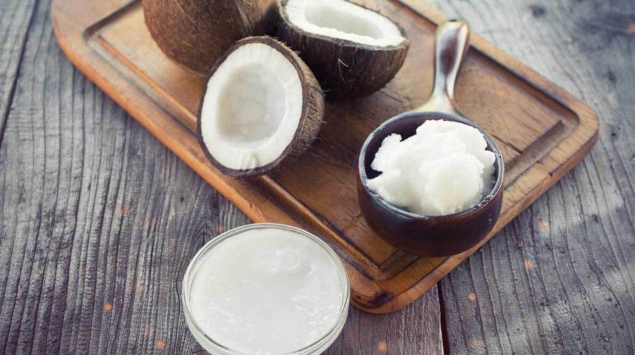 coconuts coconut oil on chopping board 1296x728 0