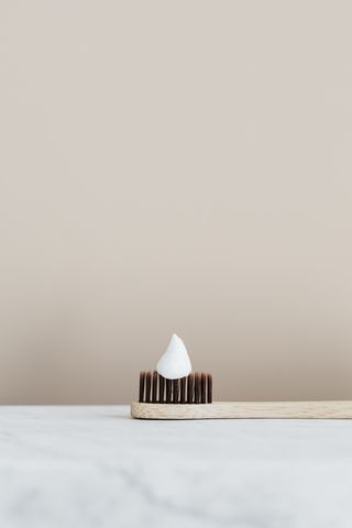 photo of toothpaste on toothbrush 4202927
